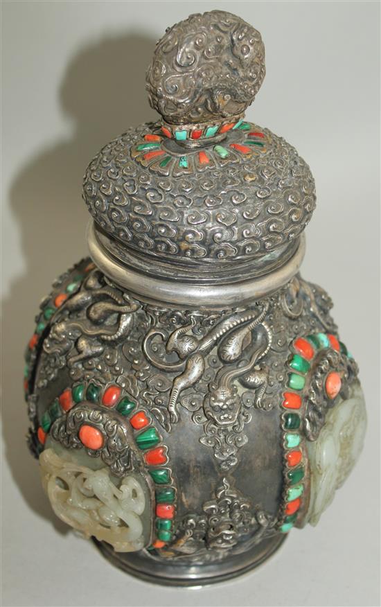 A Tibetan silver, jade, coral, malachite and turquoise mounted ritual jar and cover, 19th century, 25.5cm